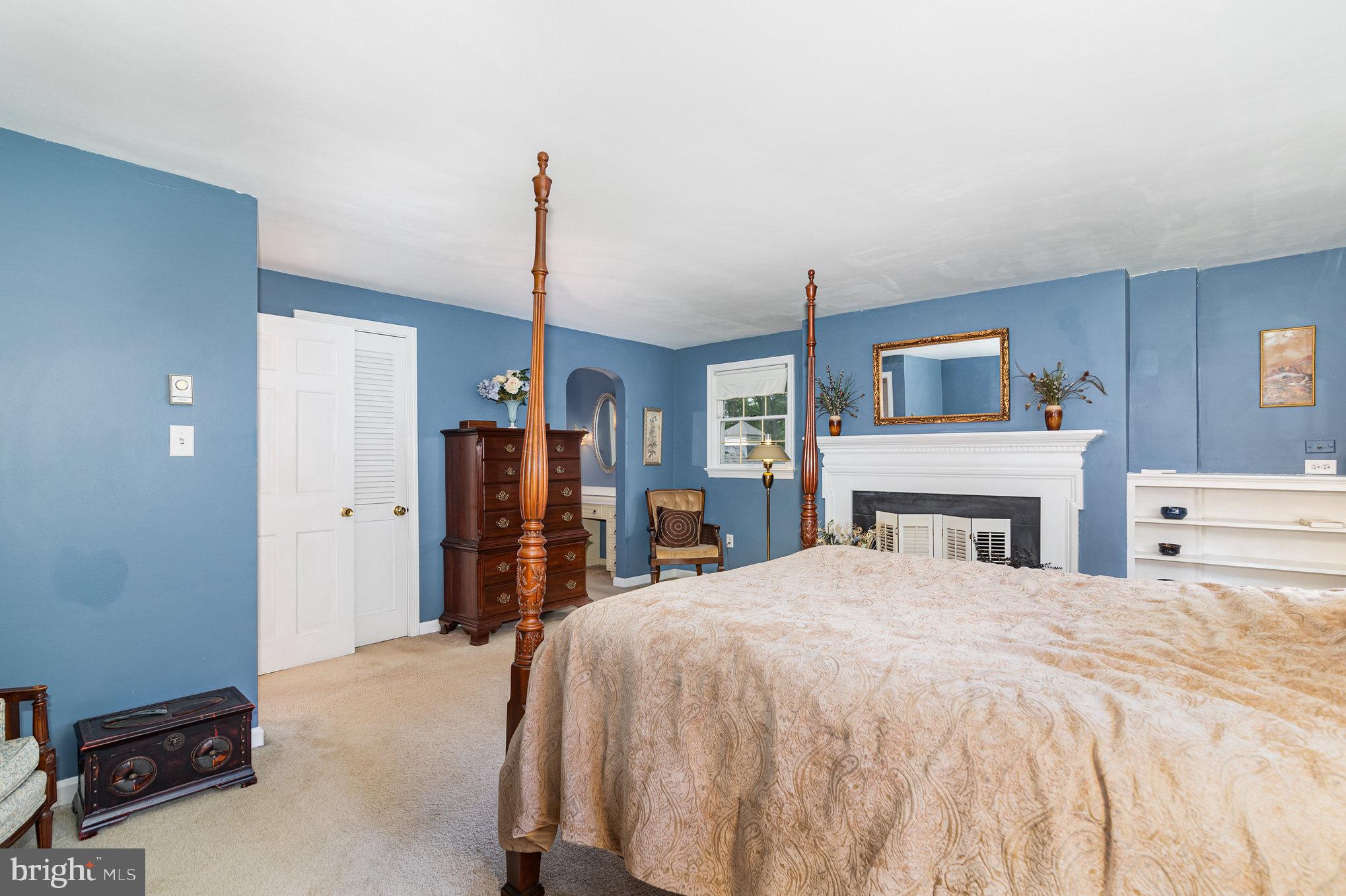 2221 Mockingbird Road Harrisburg, PA 17112 - Photo 20 of 35 a large bedroom with a bed and a flat tv screen