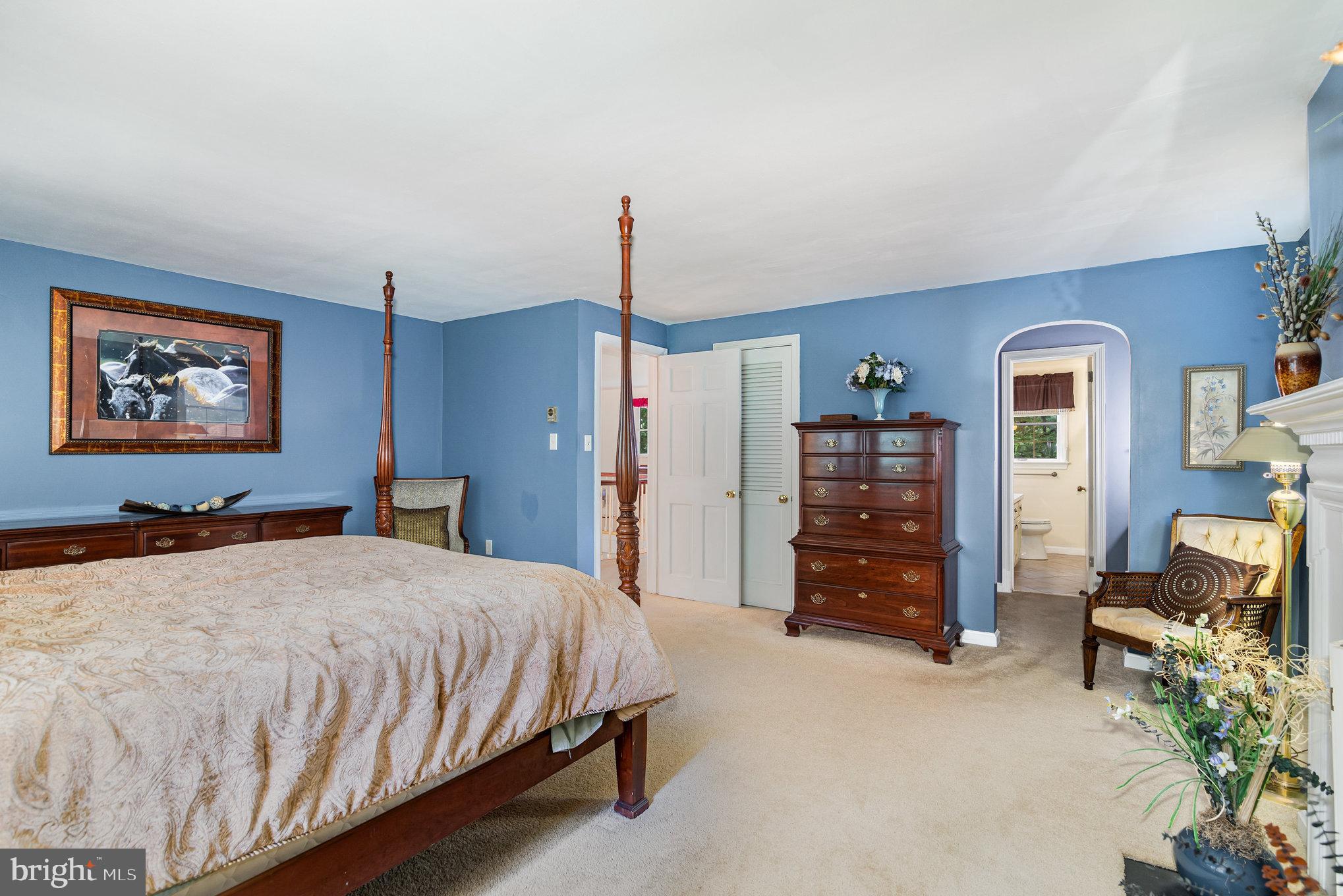 2221 Mockingbird Road Harrisburg, PA 17112 - Photo 21 of 35 a bedroom with a bed a dresser and book shelf