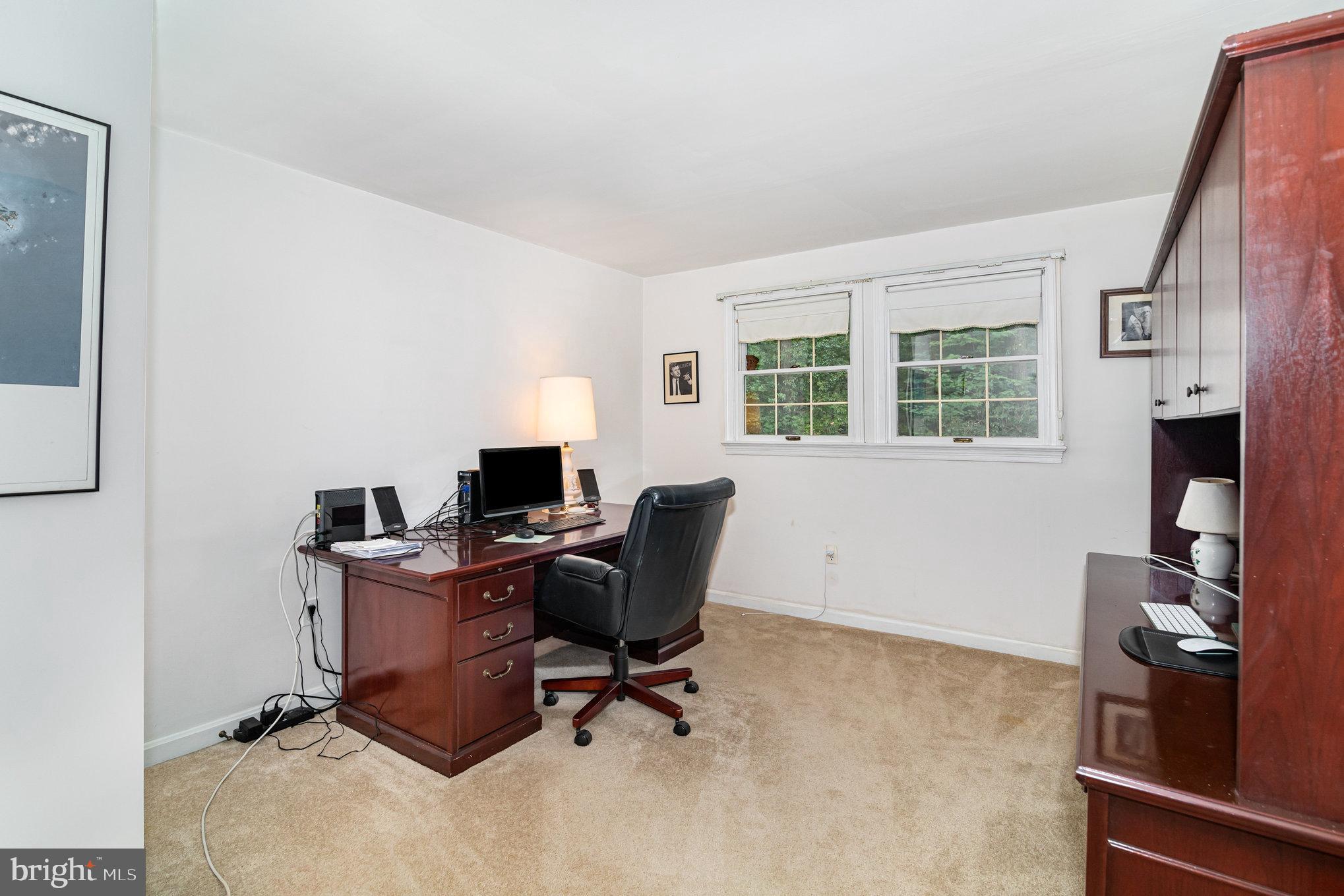 2221 Mockingbird Road Harrisburg, PA 17112 - Photo 28 of 35 a view of a workspace with furniture and a window