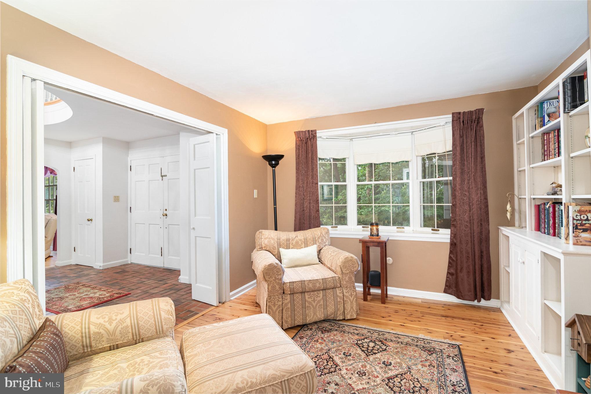 2221 Mockingbird Road Harrisburg, PA 17112 - Photo 3 of 35 a bedroom with furniture and a rug