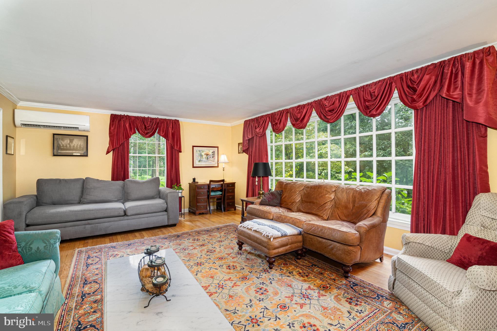 2221 Mockingbird Road Harrisburg, PA 17112 - Photo 7 of 35 a living room with furniture and a large window
