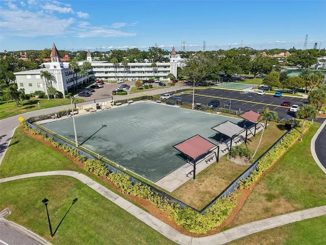 a view of a swimming pool with a lounge chairs