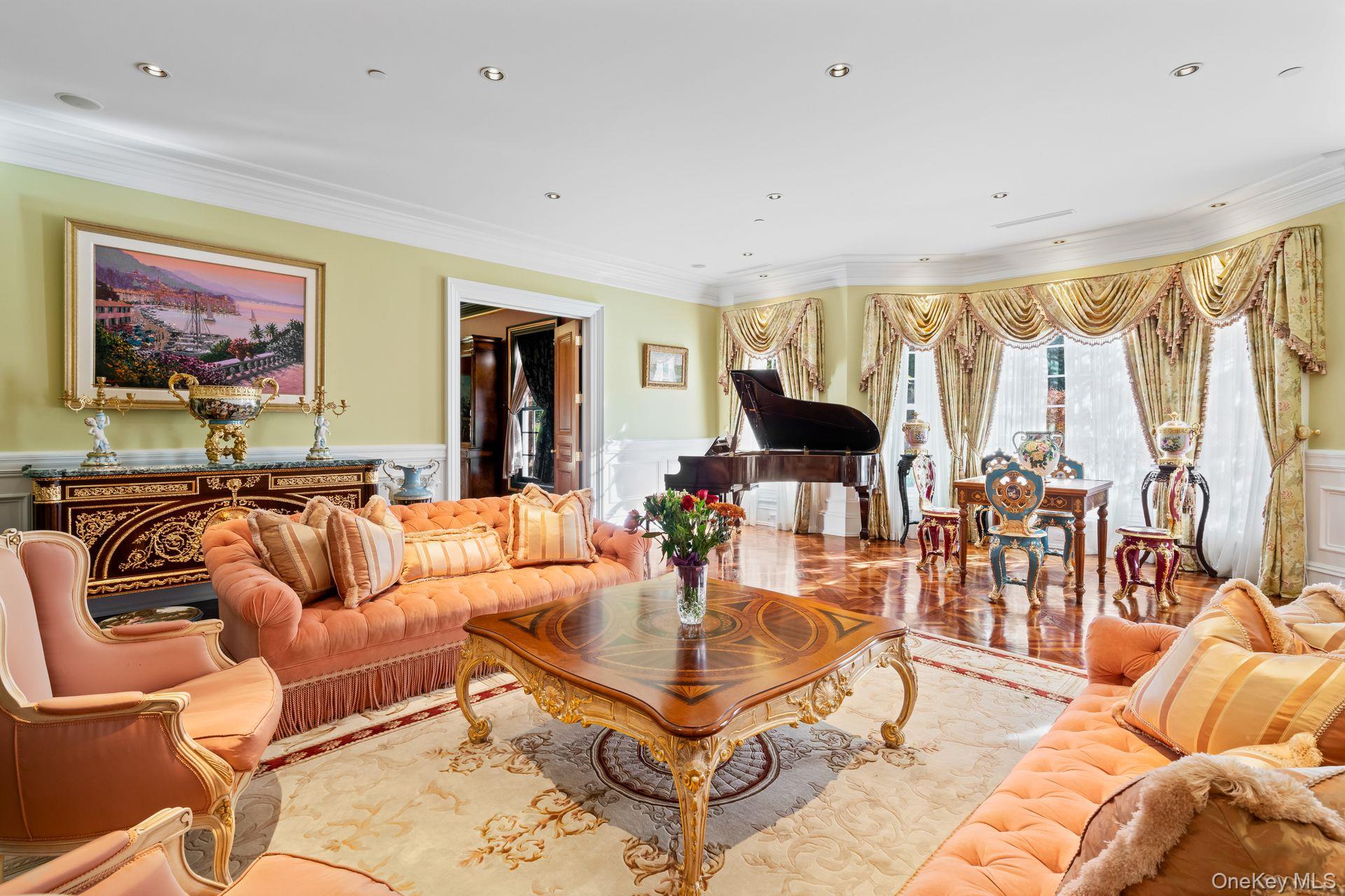 660 Chicken Valley Road Locust Valley, NY 11560 - Photo 6 of 48 Spacious formal living room with recessed lighting, crown molding, wood-finish flooring, and a large bay window with decorative valances
