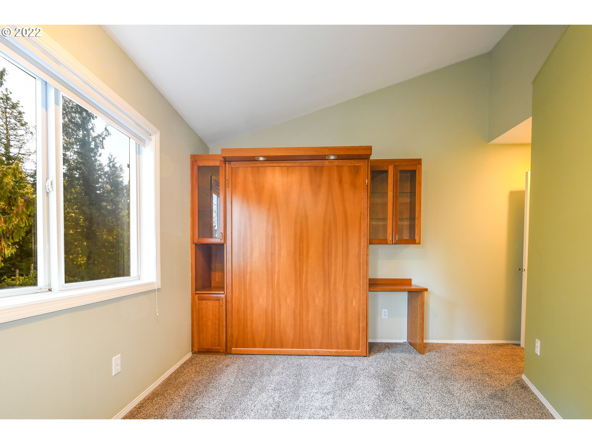 18604 Northwest 64th Avenue Ridgefield, WA 98642 - Photo 22 of 32 a view of an empty room with a window