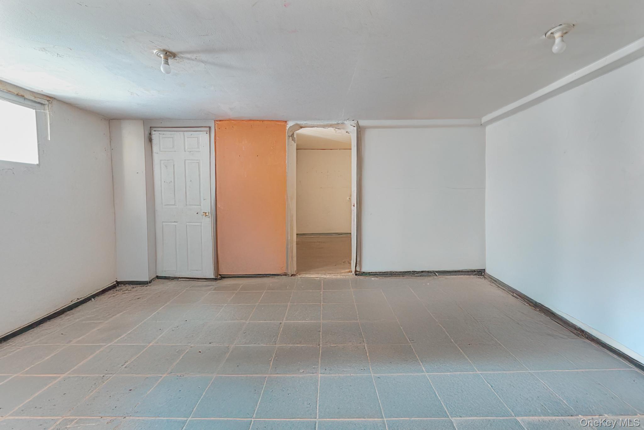 12-16 30th Drive Queens, NY 11102 - Photo 21 of 34 a view of an empty room