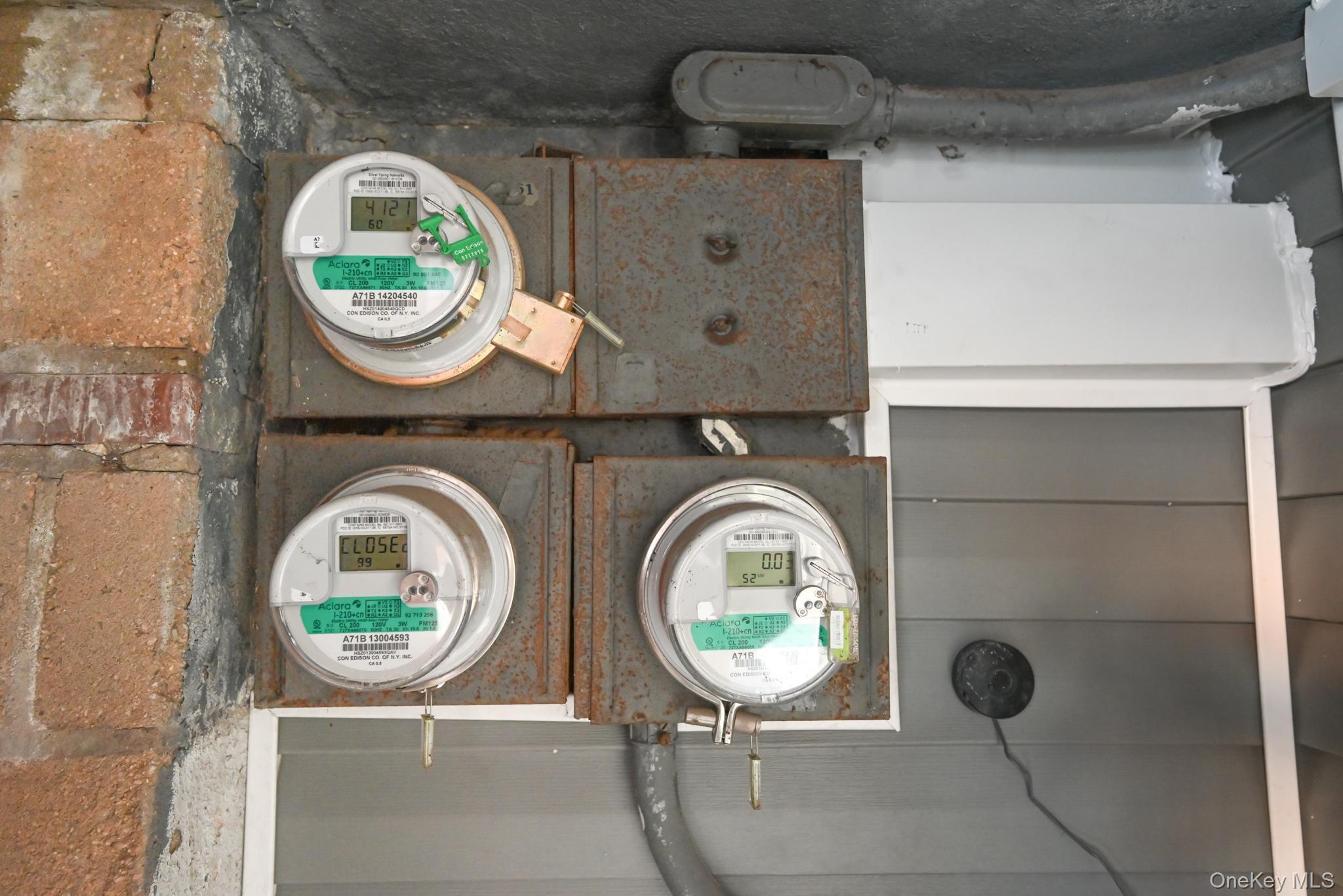 12-16 30th Drive Queens, NY 11102 - Photo 25 of 34 a bathroom with a toilet and a mirror