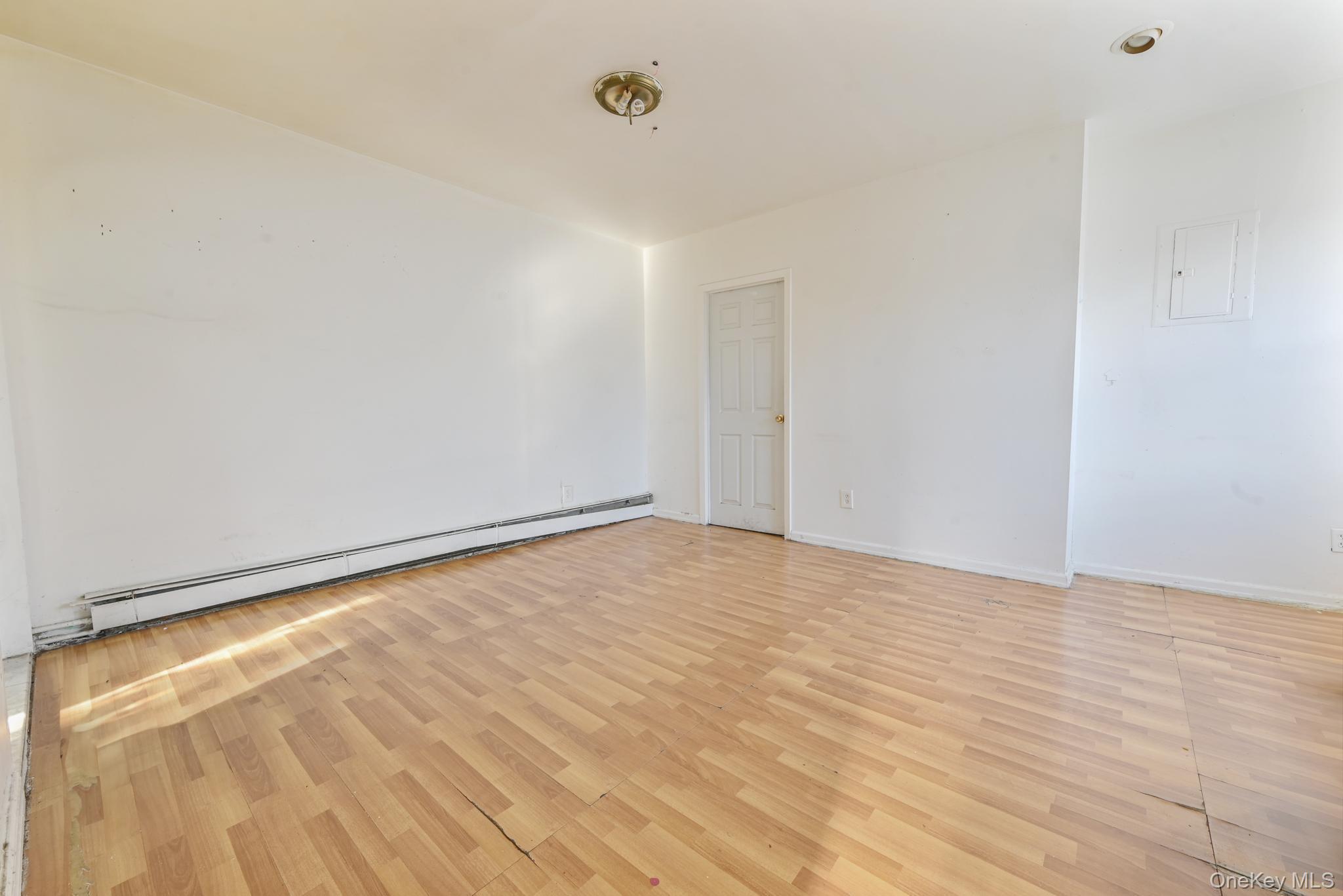 12-16 30th Drive Queens, NY 11102 - Photo 10 of 34 a view of an empty room