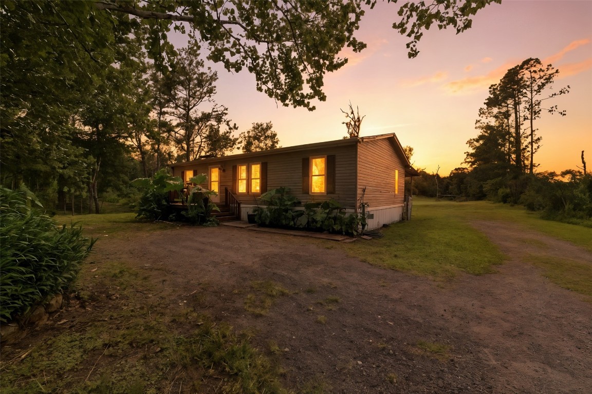 44586 Maplewood Court Callahan, FL 32011 - Photo 2 of 19 a view of a house with a yard