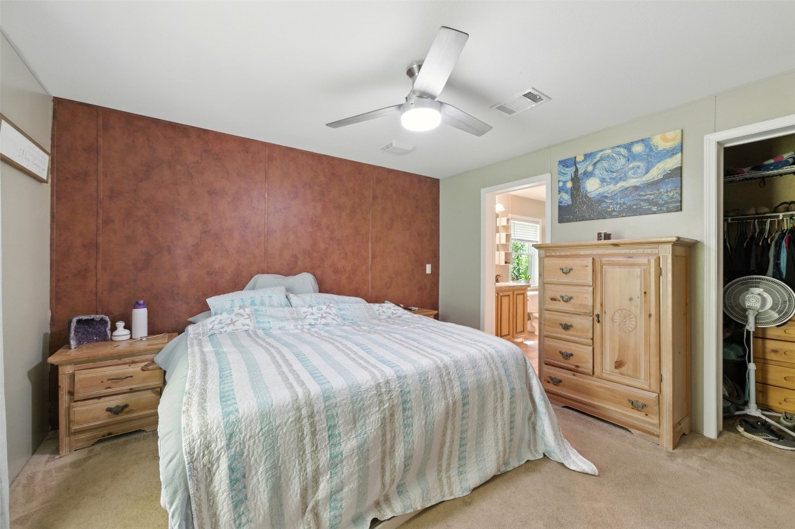 44586 Maplewood Court Callahan, FL 32011 - Photo 6 of 19 a bedroom with a bed and a view of bedroom