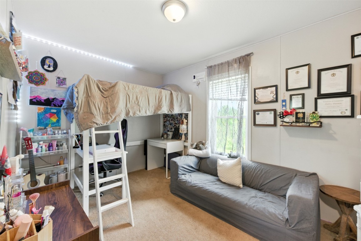 44586 Maplewood Court Callahan, FL 32011 - Photo 9 of 19 a living room with furniture and a window