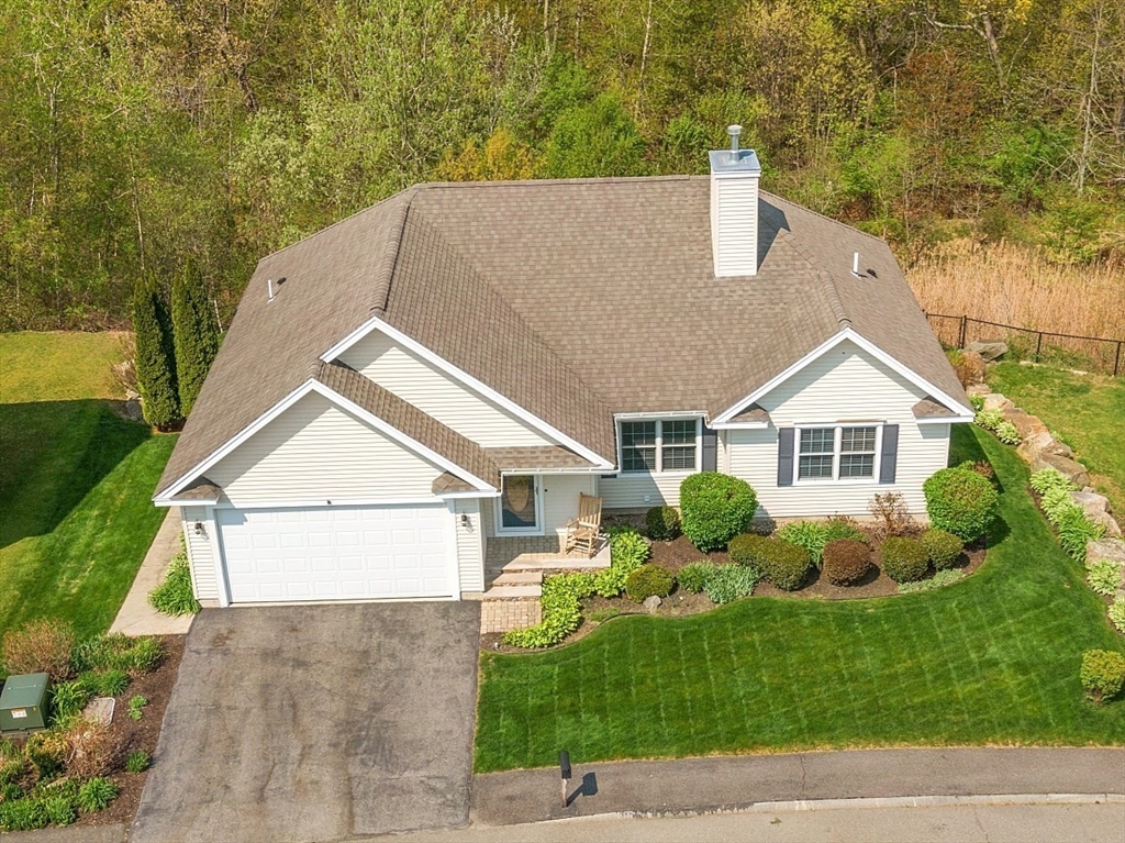 a house view with a garden space
