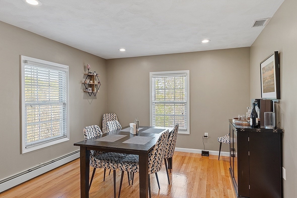 159 Judge Road Lynn, MA 01904 - Photo 12 of 41 a view of a dining room with furniture and wooden floor