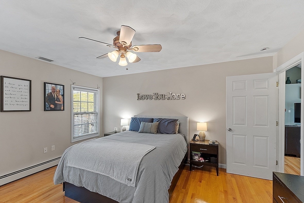 159 Judge Road Lynn, MA 01904 - Photo 22 of 41 a bedroom with a bed and a tv on the dresser