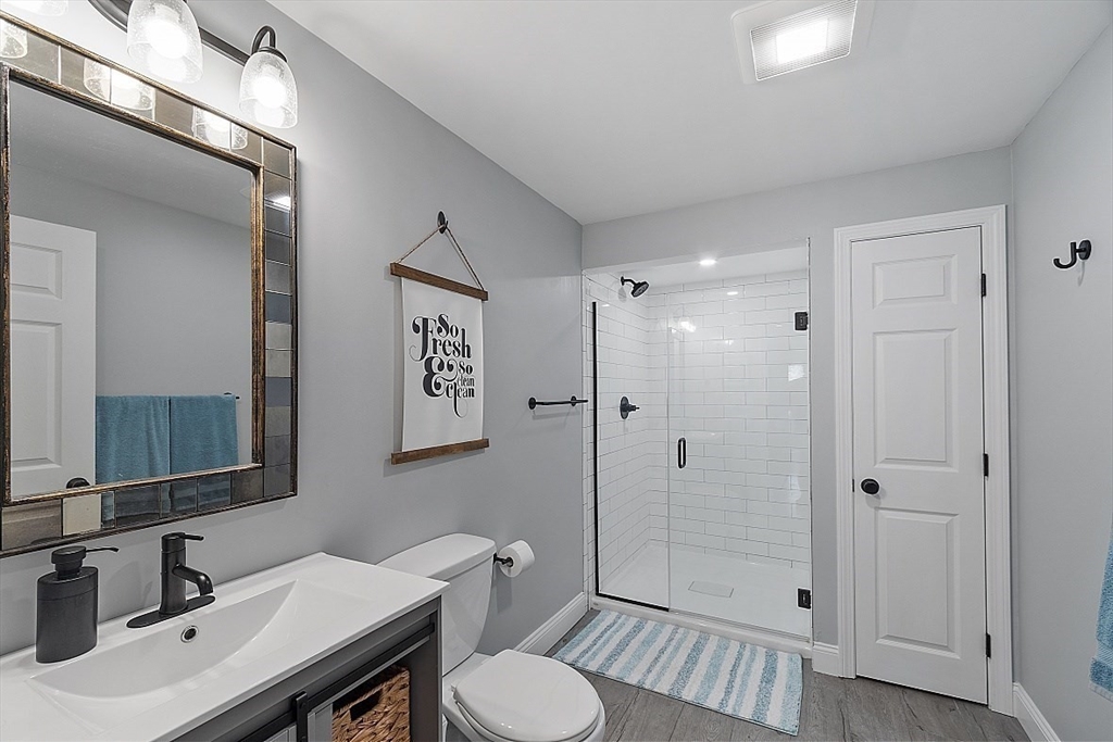 159 Judge Road Lynn, MA 01904 - Photo 27 of 41 a bathroom with a sink toilet a mirror and shower