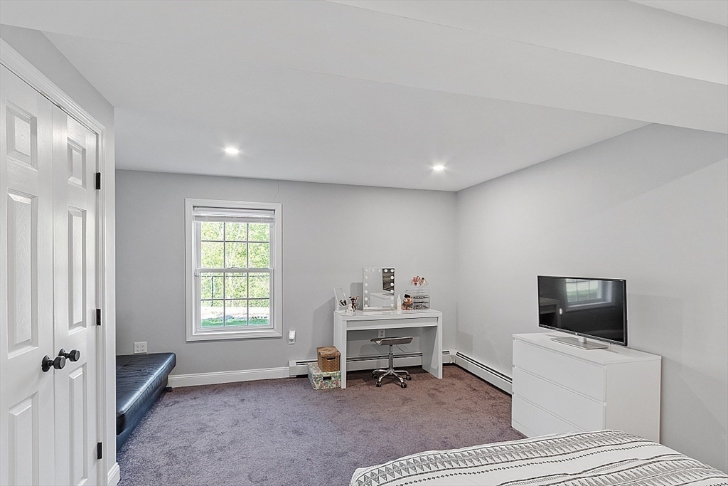 159 Judge Road Lynn, MA 01904 - Photo 30 of 41 a living room with furniture a flat screen tv and a window