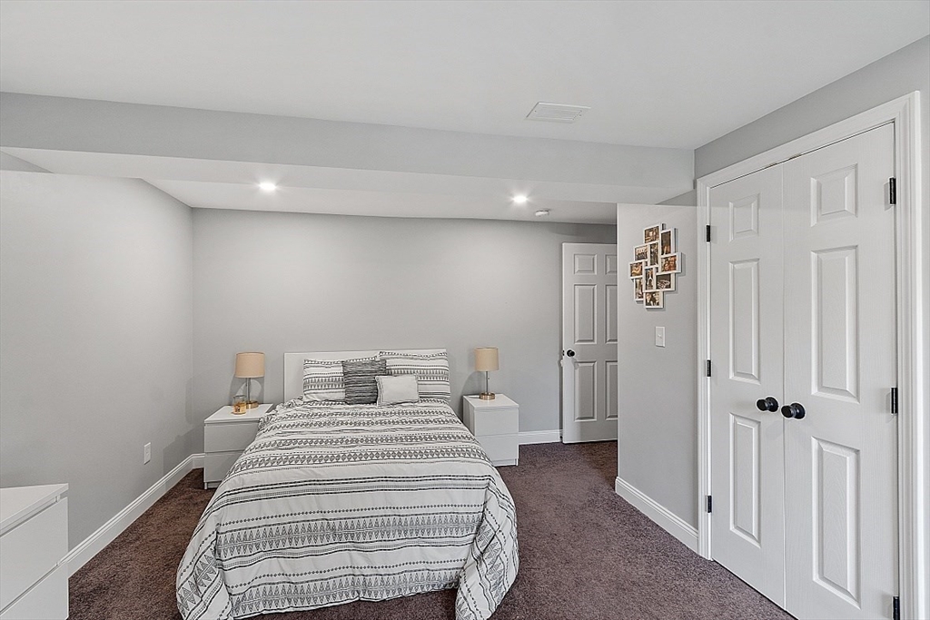 159 Judge Road Lynn, MA 01904 - Photo 31 of 41 a bedroom with a bed and a view of closet