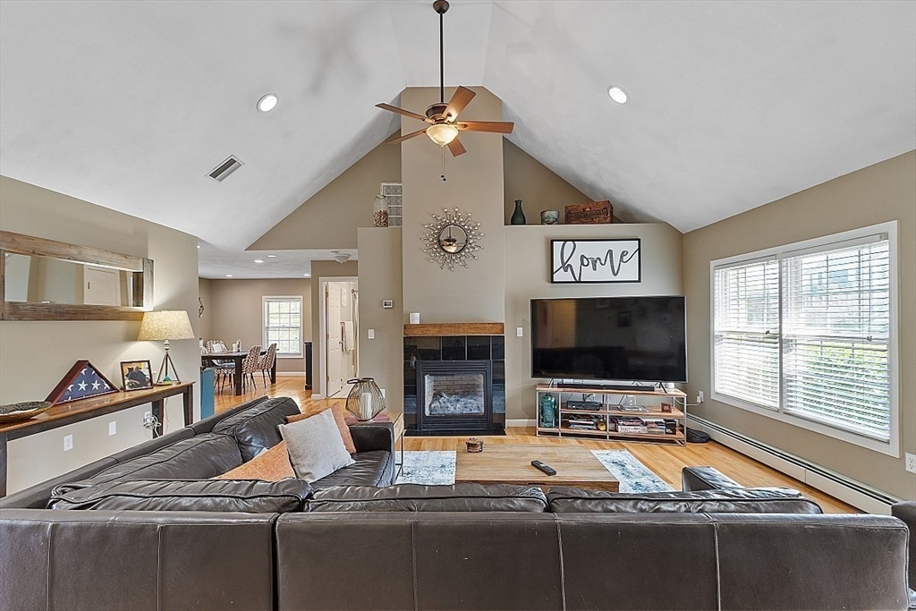 159 Judge Road Lynn, MA 01904 - Photo 4 of 41 a living room with fireplace furniture and a flat screen tv