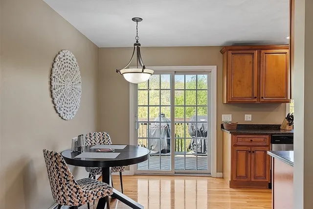 a view of a room with furniture window and wooden floor