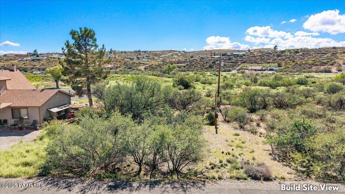 20241 East Lakeside Road Mayer, AZ 86333 - Photo 7 of 11 a view of a city with tall trees