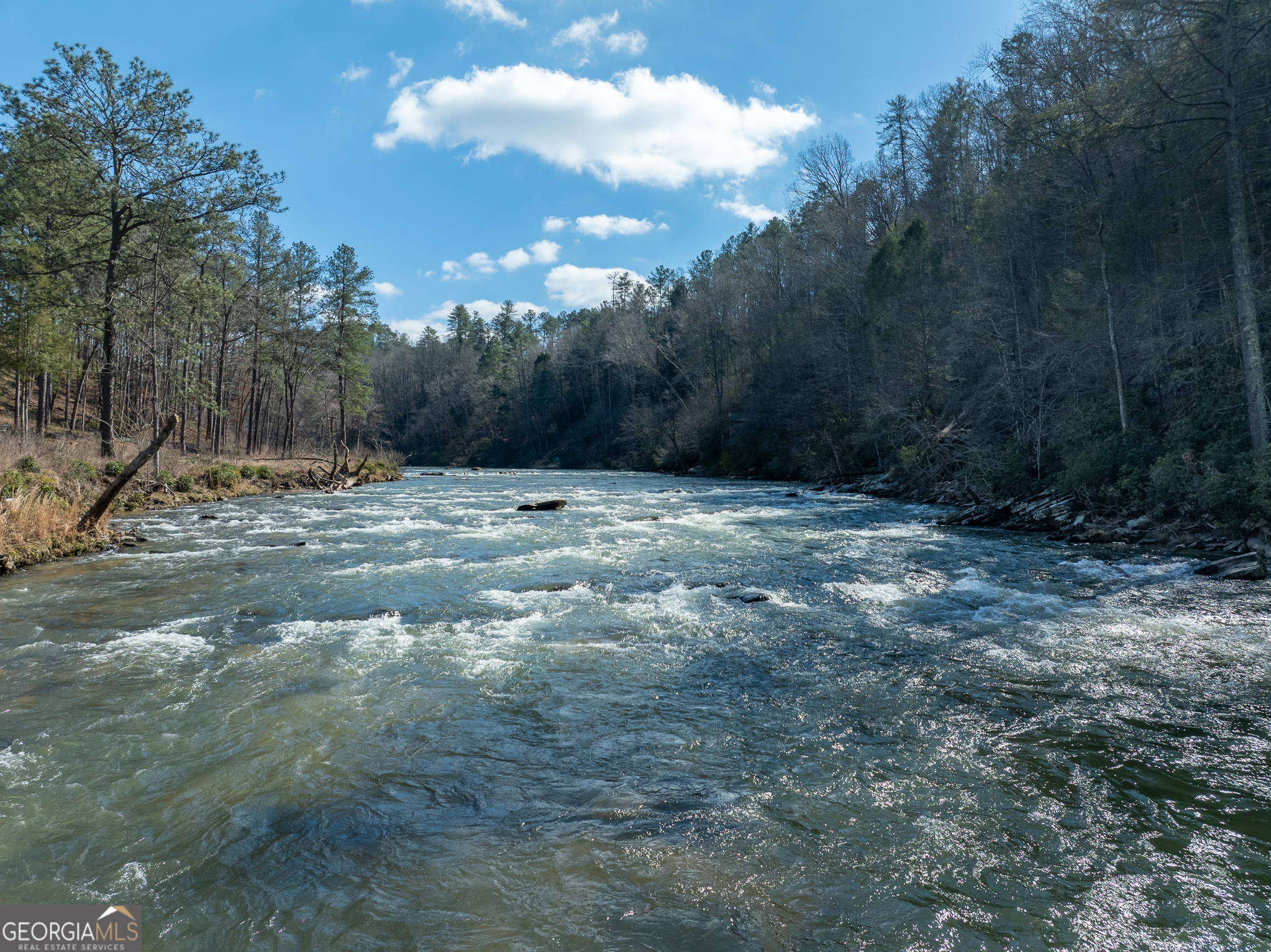 Lot 127 Red Hawk Lane Ellijay, GA 30540 - Photo 27 of 35 a view of dirt field with trees