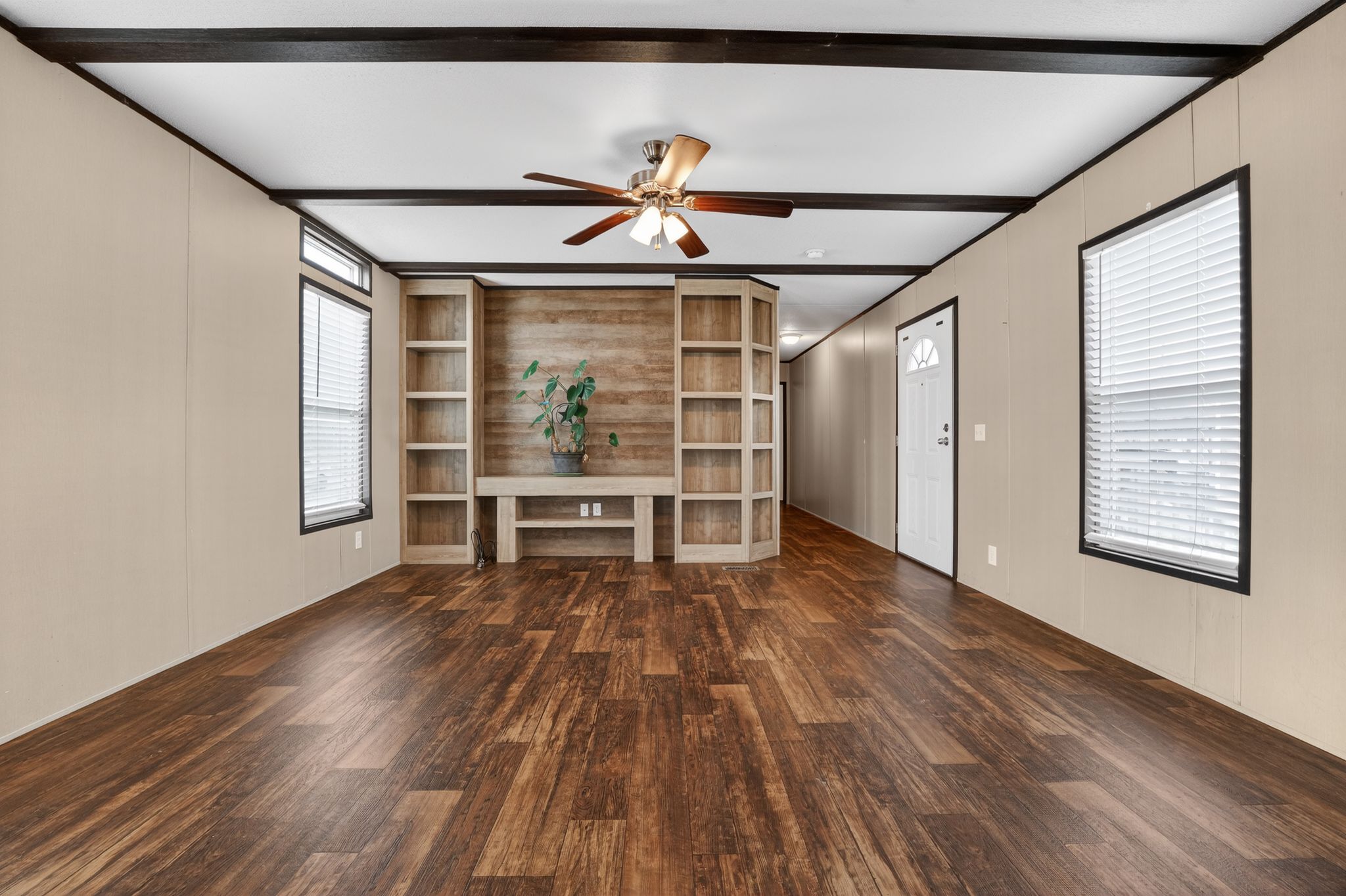 16 4th Street Maxwell, TX 78656 - Photo 12 of 35 a view of room with wooden floor and window