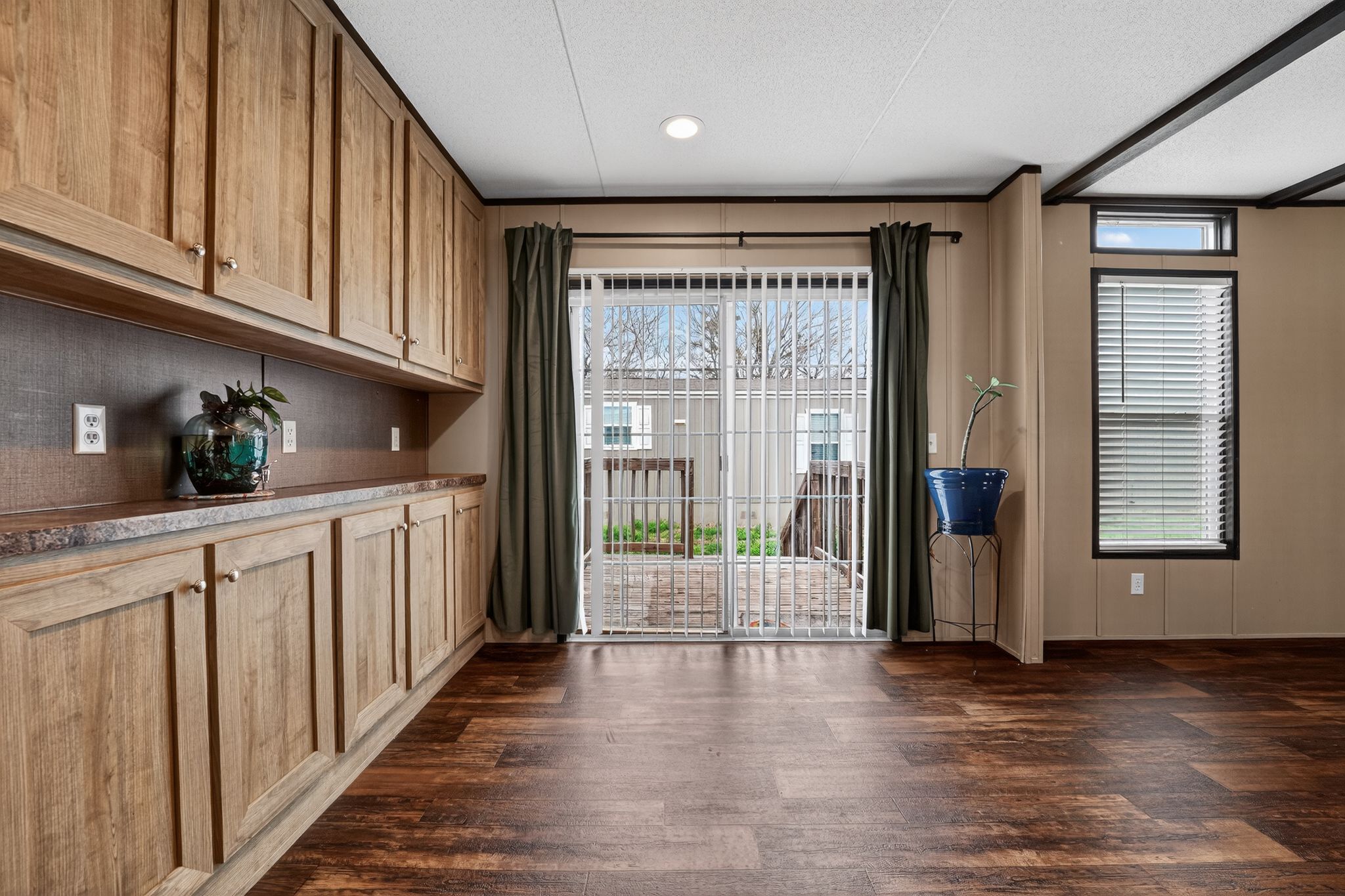 16 4th Street Maxwell, TX 78656 - Photo 27 of 35 a view of hallway with wooden floor and cabinet