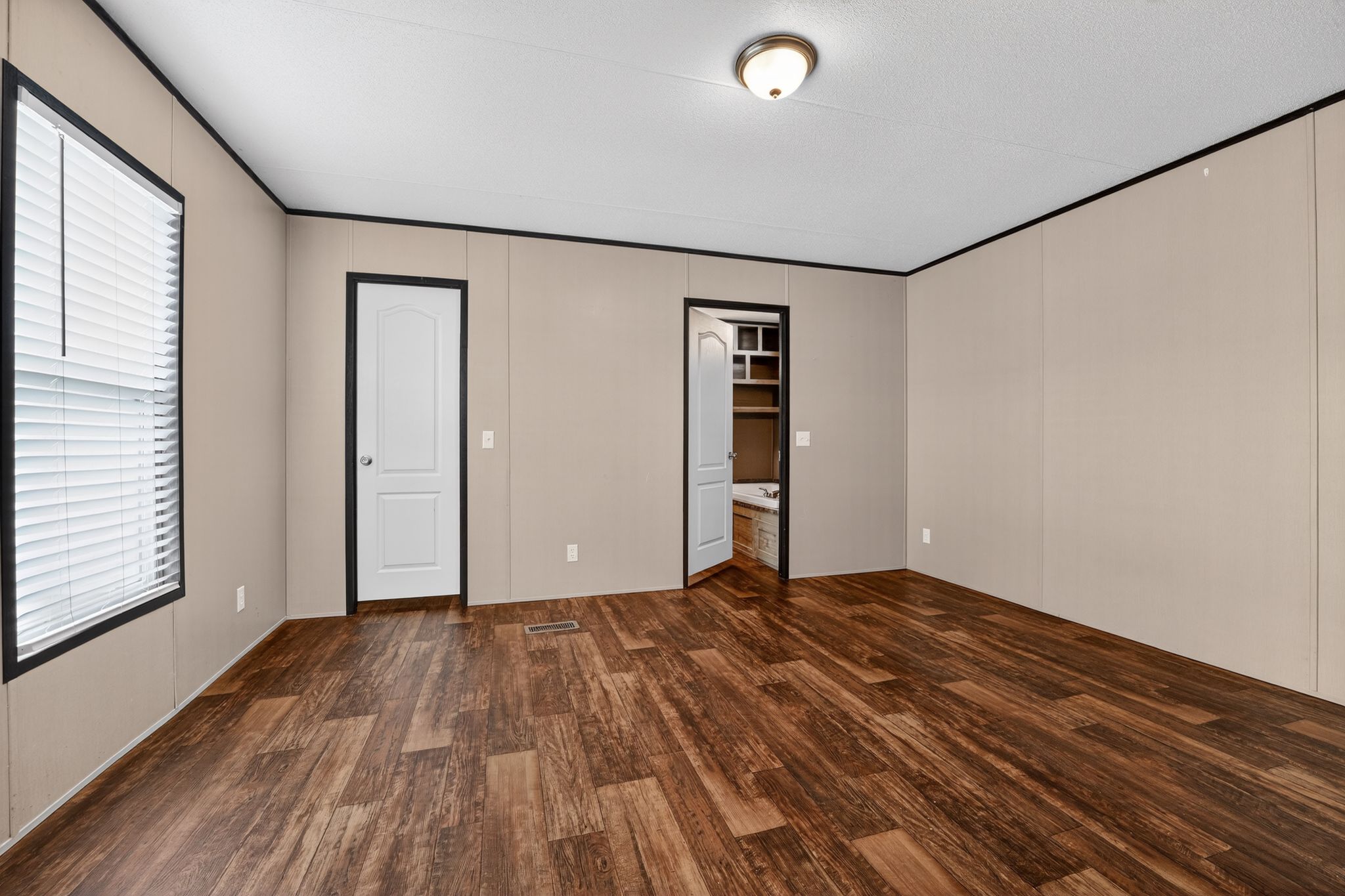 16 4th Street Maxwell, TX 78656 - Photo 29 of 35 a view of an empty room with closet and a window