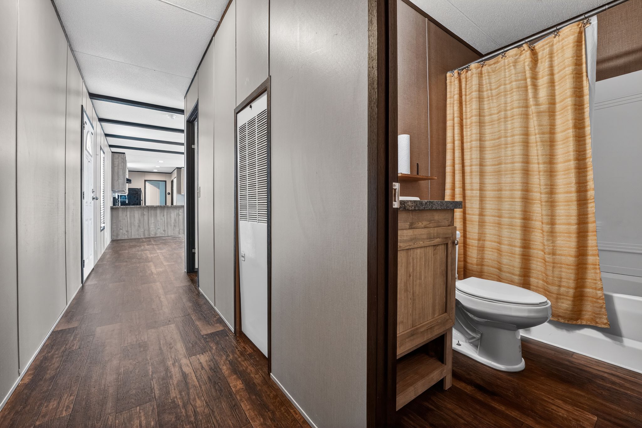 16 4th Street Maxwell, TX 78656 - Photo 34 of 35 a white toilet sitting next to a bathroom sink