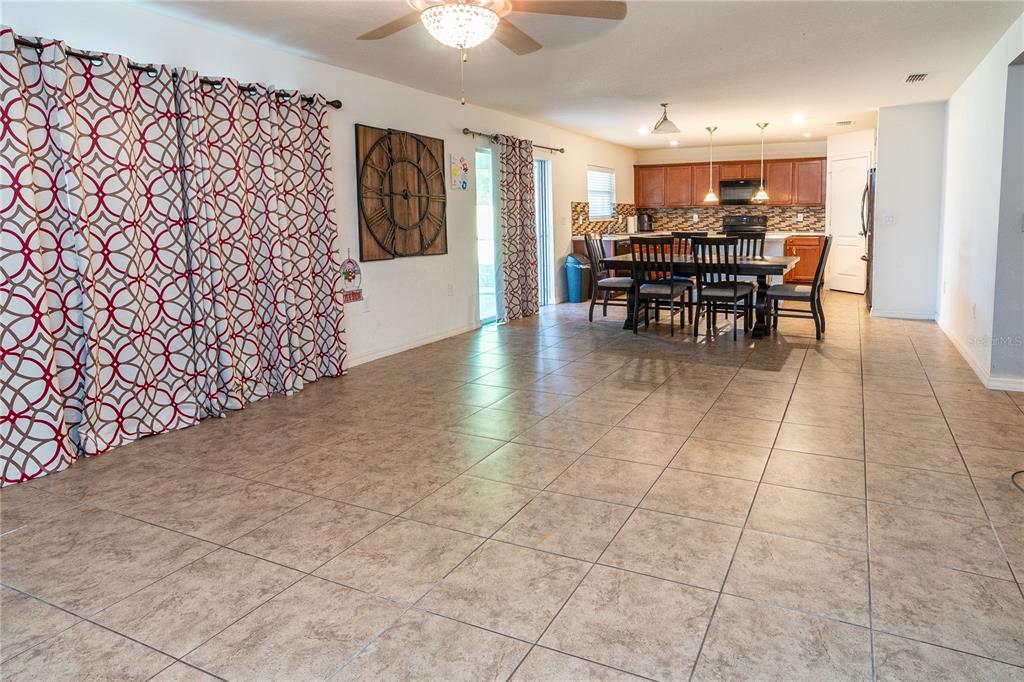 4563 Orchard Grove Road St. Cloud, FL 34772 - Photo 34 of 51 a view of a dining room with furniture