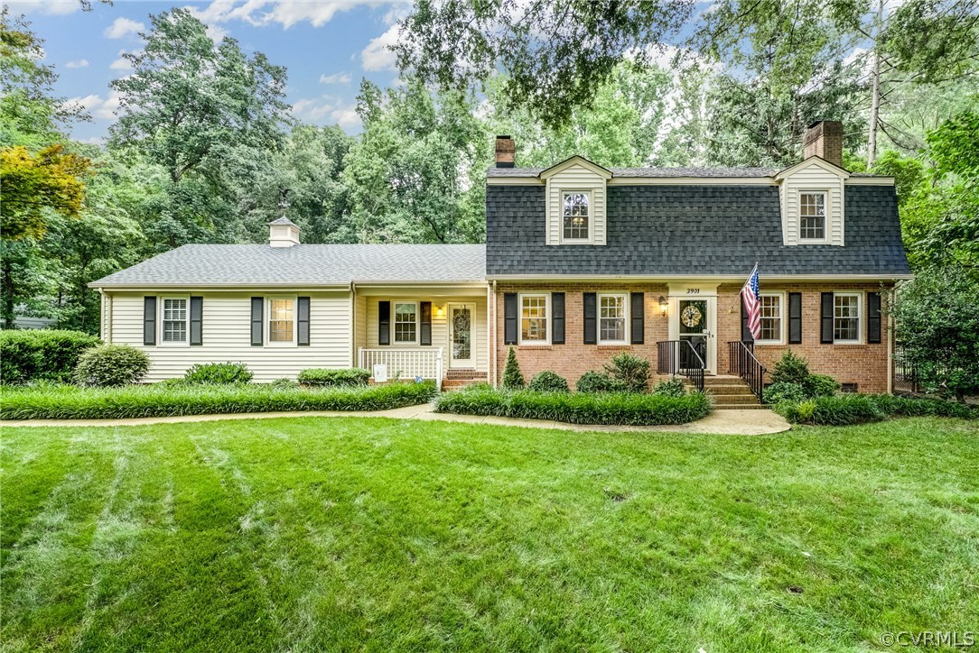 3901 Cheyenne Road Richmond, VA 23235 - Photo 1 of 49 a front view of a house with a yard