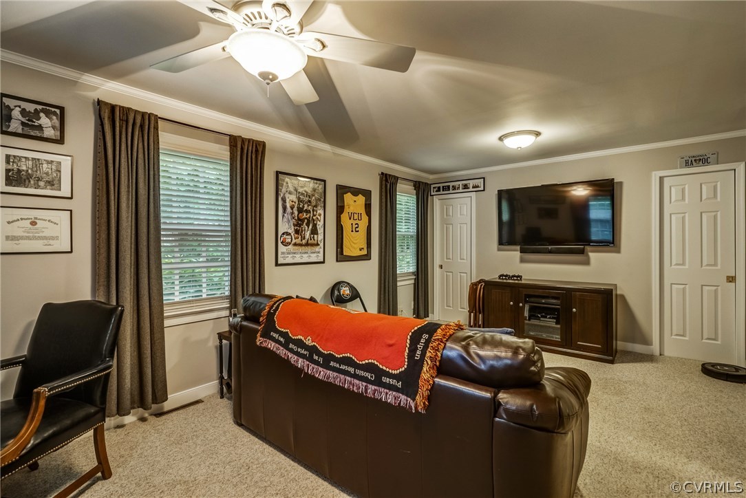 3901 Cheyenne Road Richmond, VA 23235 - Photo 20 of 49 a living room with furniture and a flat screen tv