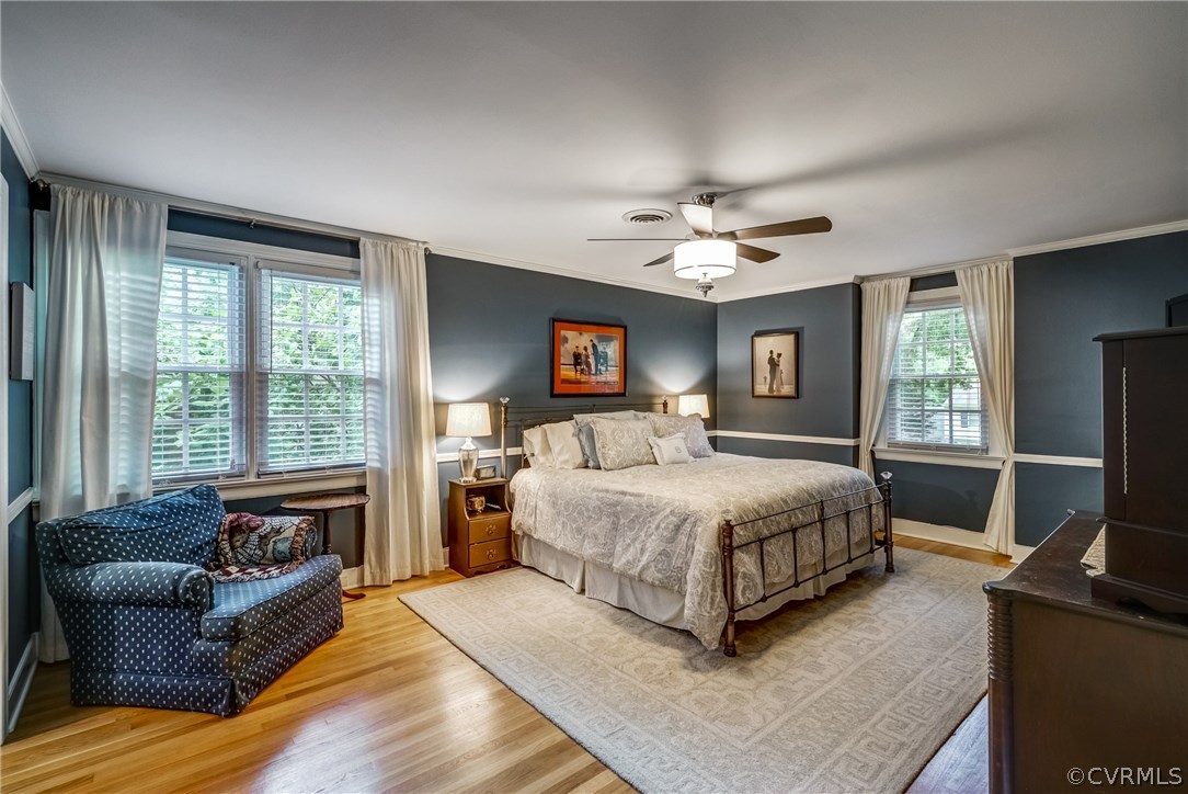 3901 Cheyenne Road Richmond, VA 23235 - Photo 25 of 49 a spacious bedroom with a bed couch and windows