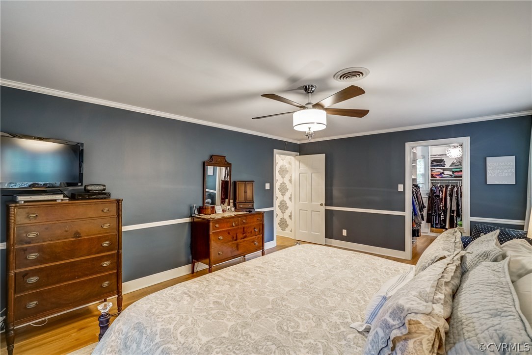 3901 Cheyenne Road Richmond, VA 23235 - Photo 26 of 49 a bedroom with a bed and a flat screen tv