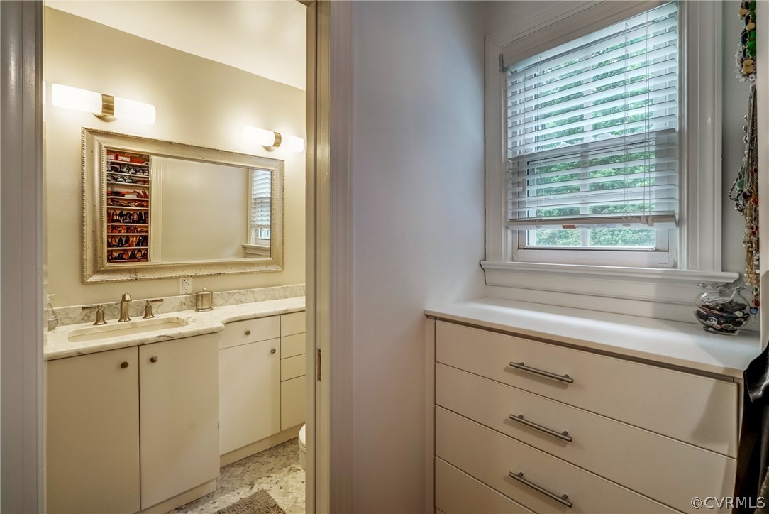 3901 Cheyenne Road Richmond, VA 23235 - Photo 28 of 49 a bathroom with a sink and a window