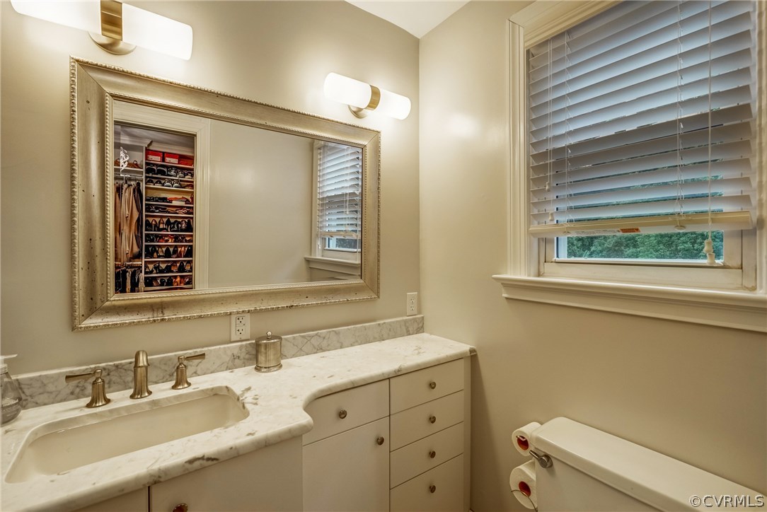 3901 Cheyenne Road Richmond, VA 23235 - Photo 29 of 49 a bathroom with a sink a vanity and a mirror