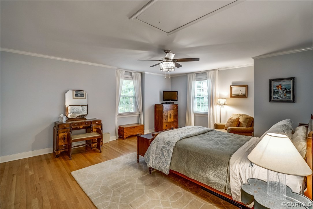 3901 Cheyenne Road Richmond, VA 23235 - Photo 31 of 49 a bedroom with a bed and wooden floor