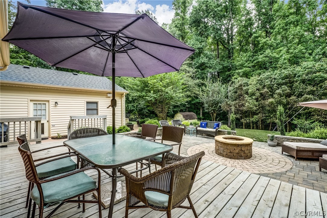 3901 Cheyenne Road Richmond, VA 23235 - Photo 42 of 49 a view of backyard with seating space and barbeque oven
