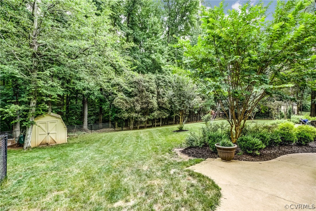 3901 Cheyenne Road Richmond, VA 23235 - Photo 47 of 49 a view of a backyard with large trees