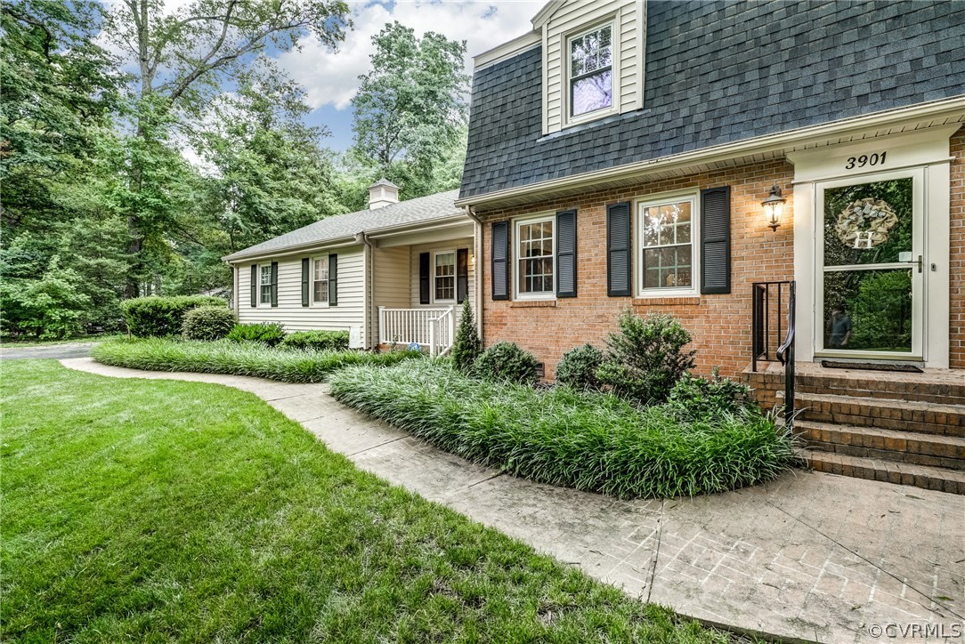 3901 Cheyenne Road Richmond, VA 23235 - Photo 49 of 49 a front view of a house with garden