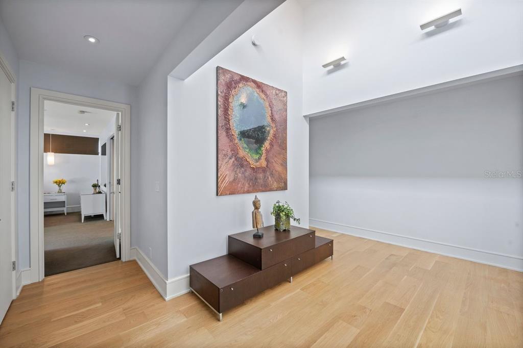 1411 Nottingham Street Orlando, FL 32803 - Photo 22 of 47 a bedroom with a bed and a painting on the wall