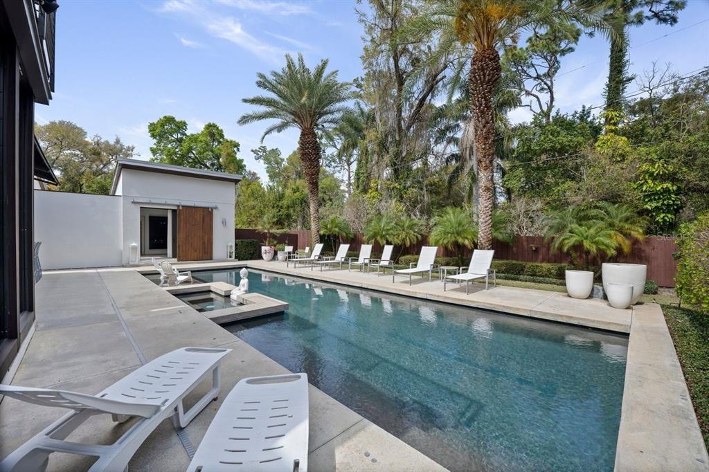 1411 Nottingham Street Orlando, FL 32803 - Photo 40 of 47 a view of a house with swimming pool and sitting area
