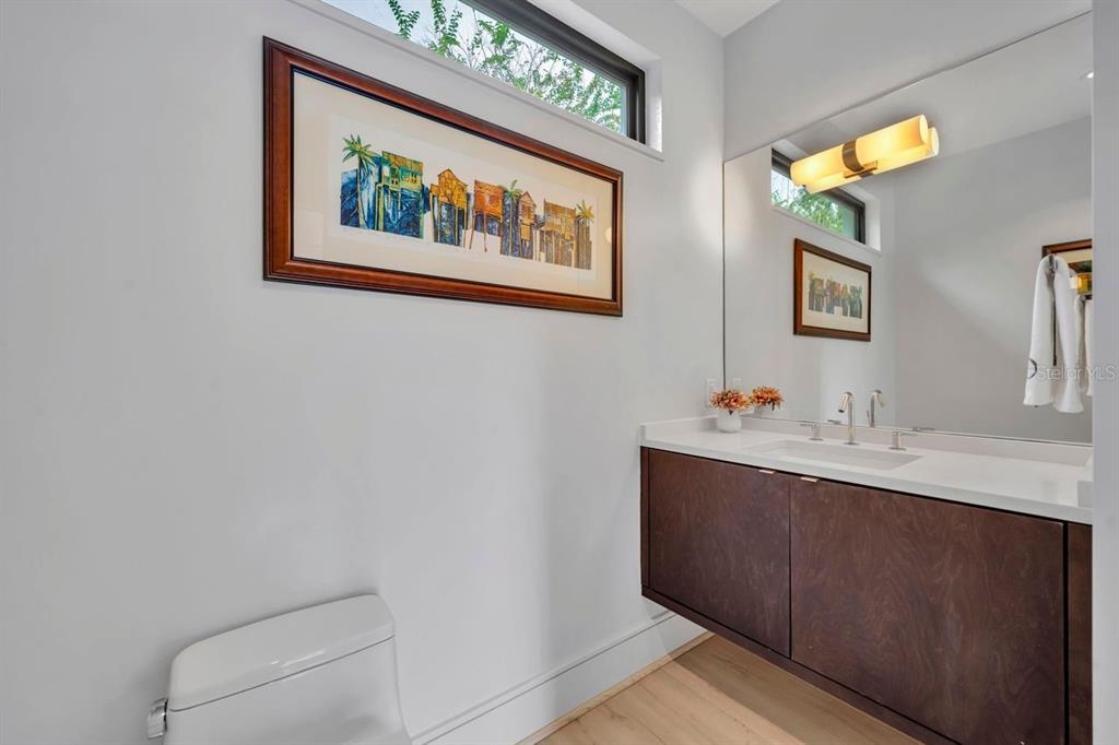 1411 Nottingham Street Orlando, FL 32803 - Photo 45 of 47 a bathroom with a sink and a mirror