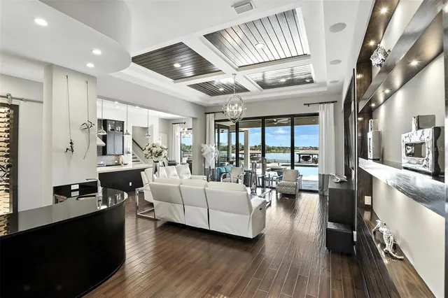 a bathroom with a granite countertop sink a toilet and a mirror