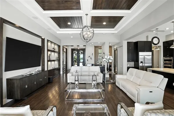 a balcony with furniture and a potted plant