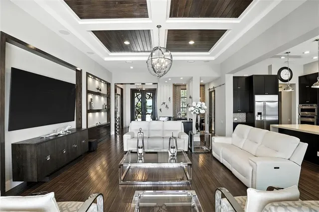 a balcony with furniture and a potted plant