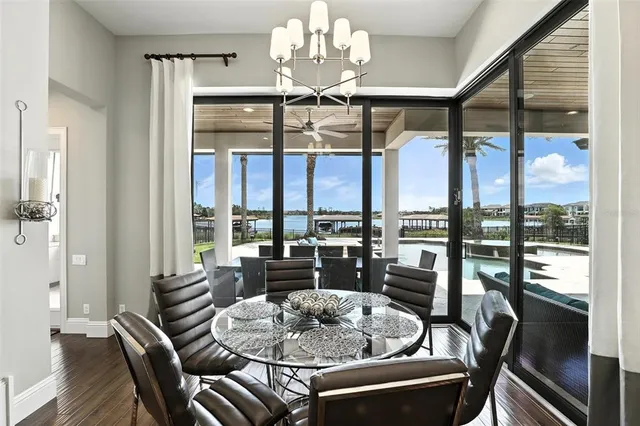 a bedroom with a bed and ceiling fan