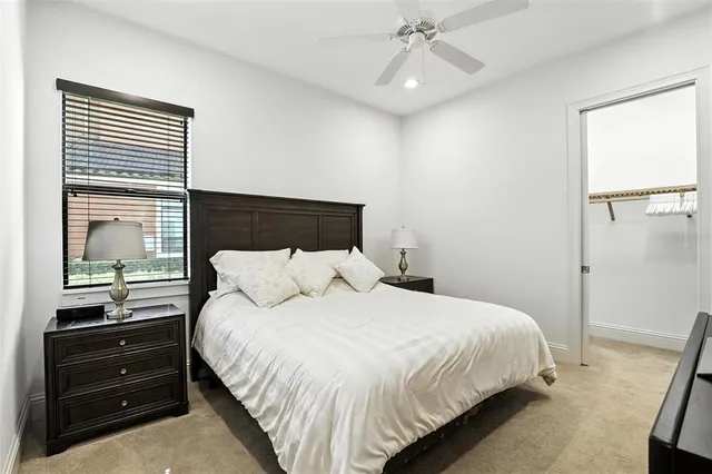 a view of a swimming pool with a table and chairs