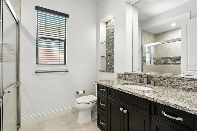 a kitchen with a sink stove and microwave