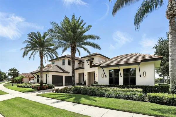 a living room with furniture a rug and a large window