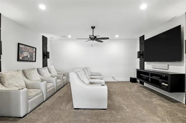 a view of a swimming pool with a table and chairs